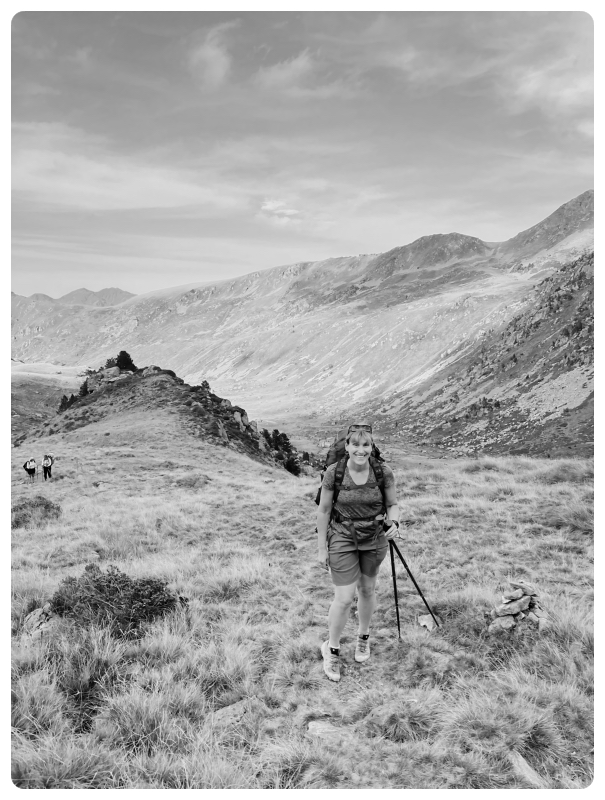 Black and white natural portrait of a woman hiking in the mountains during a vision quest adventure